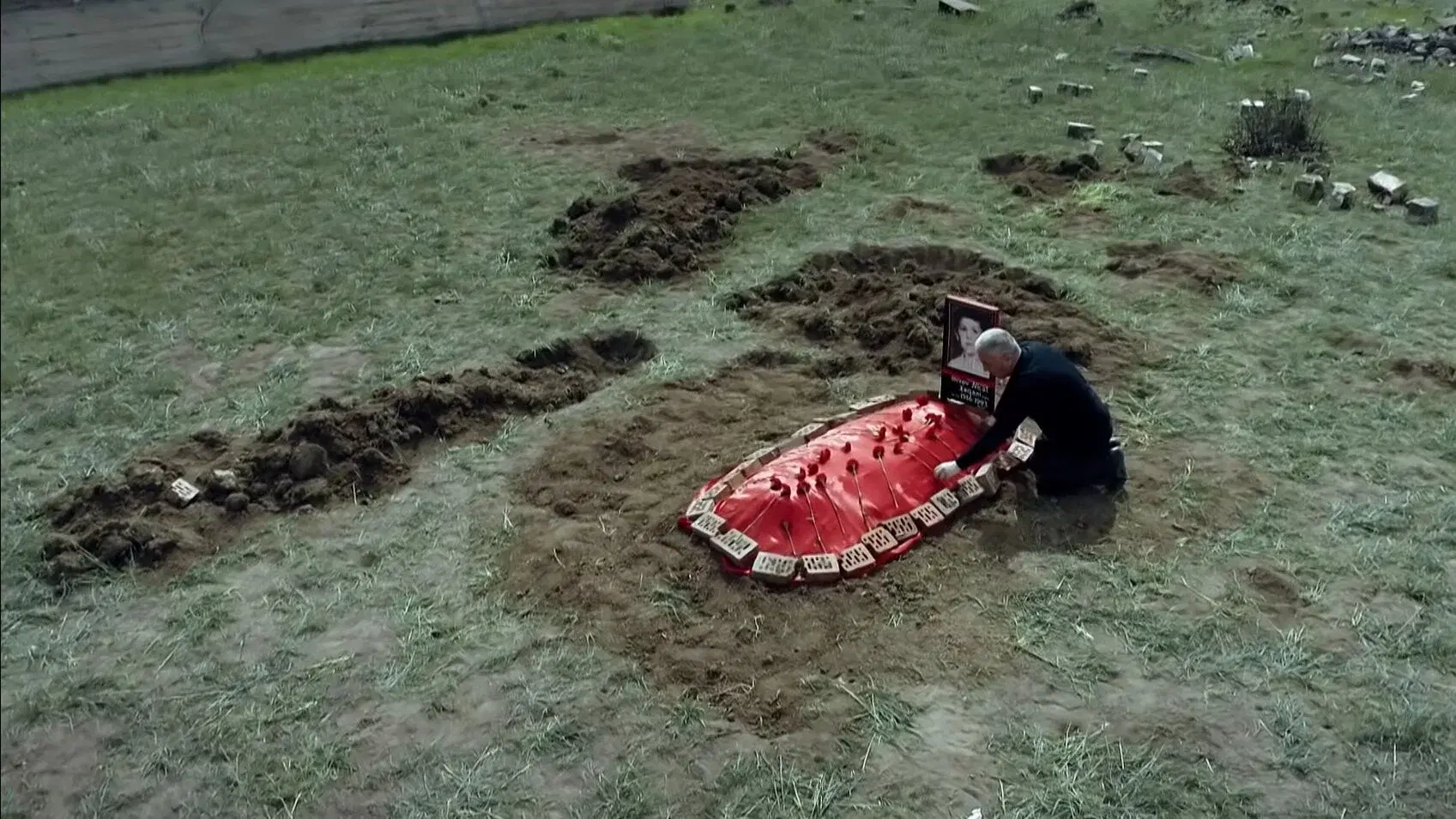 The grave under the plum tree