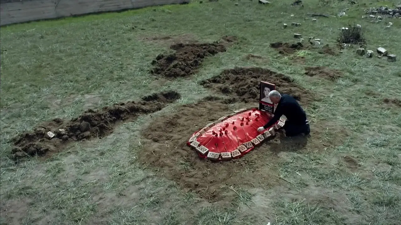 The grave under the plum tree